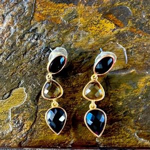 Gold tone with black and yellow post earrings.